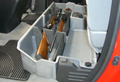 The DU-HA acts as a legal gun case in most states with seats latched down. Gun rack/organizers are made of a soft material so they won't damage guns. 