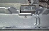 Attach DU-HA to seat bracket, using existing bolt