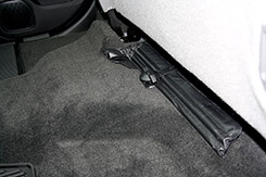 DU-HA Underseat Storage - Part # 10305 - To install this model, temporarily remove the jack tool back (by unscrewing the wingnut) from under the back seat. This will reveal a threaded stud which will fit up through the pre-drilled hole in the back center of the DU-HA.